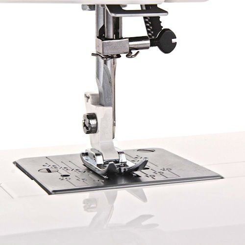 Швейная машина Janome TC 1218