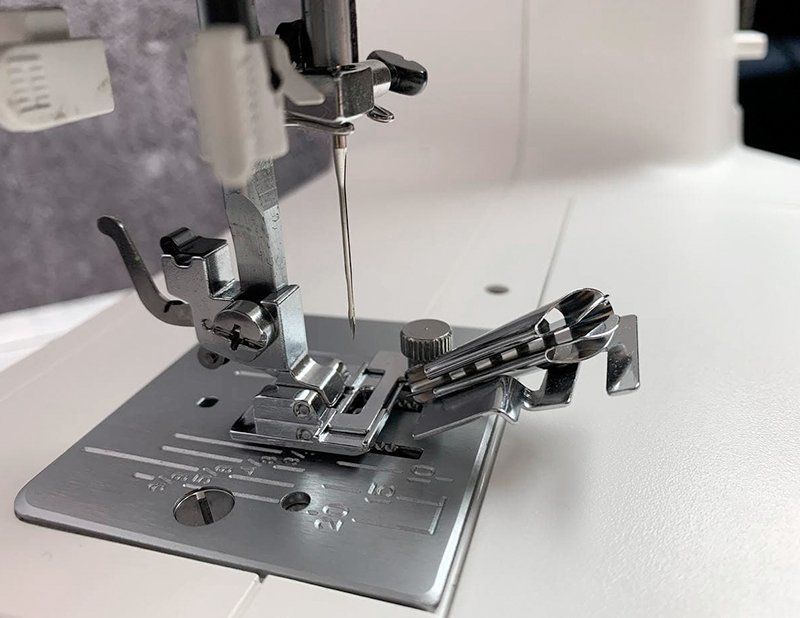 Лапка Janome для окантовывания косой бейкой (в блистере) EL- 200-313-005